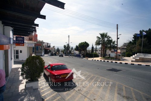 Banks and cafes on the central street in Peyia, Cyprus