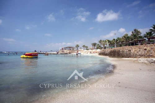Sandy beach by St George hotel in Chloraka, Cyprus
